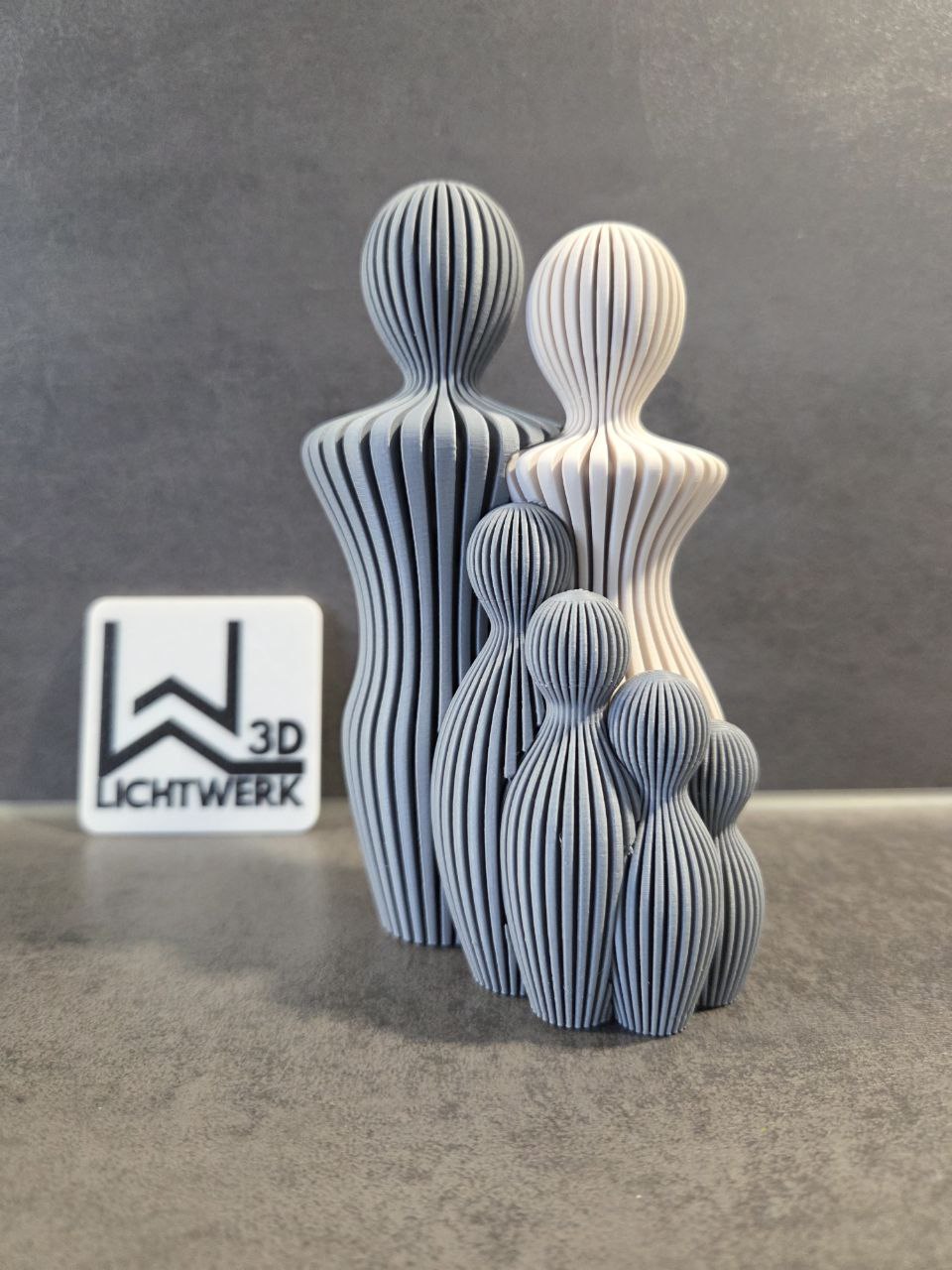 Skulptur „Großes Familienglück, vier Kinder“