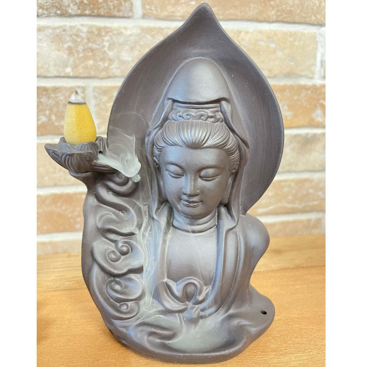 Rückflussbrunnen – ruhender Buddha