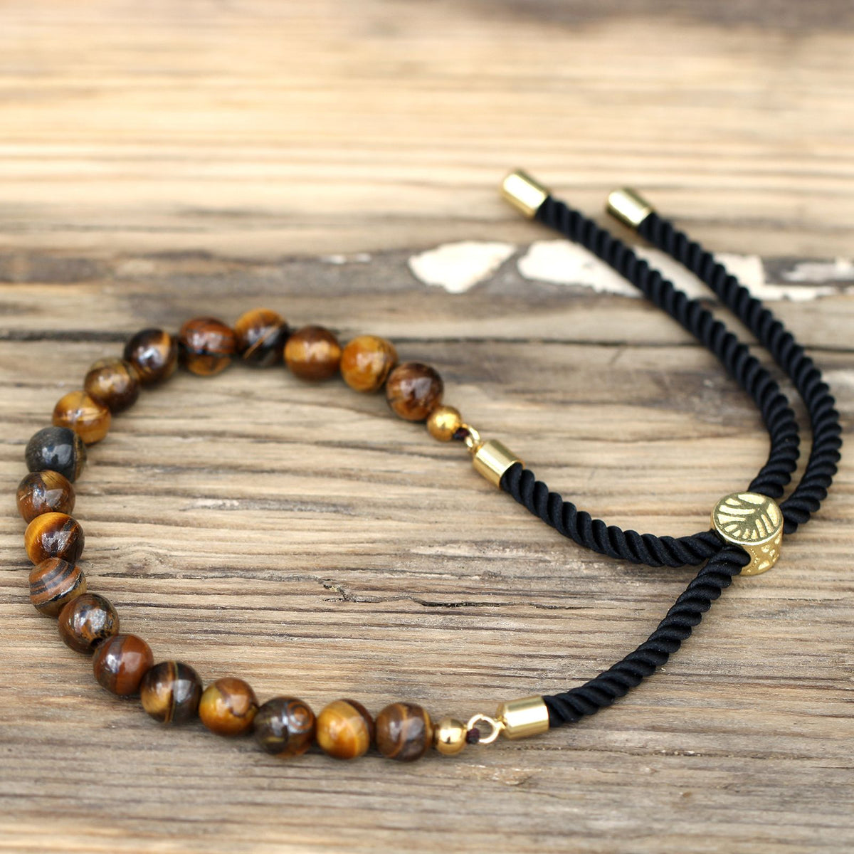 Armband – Edelstein Schnur vergoldet schwarz – Tigerauge